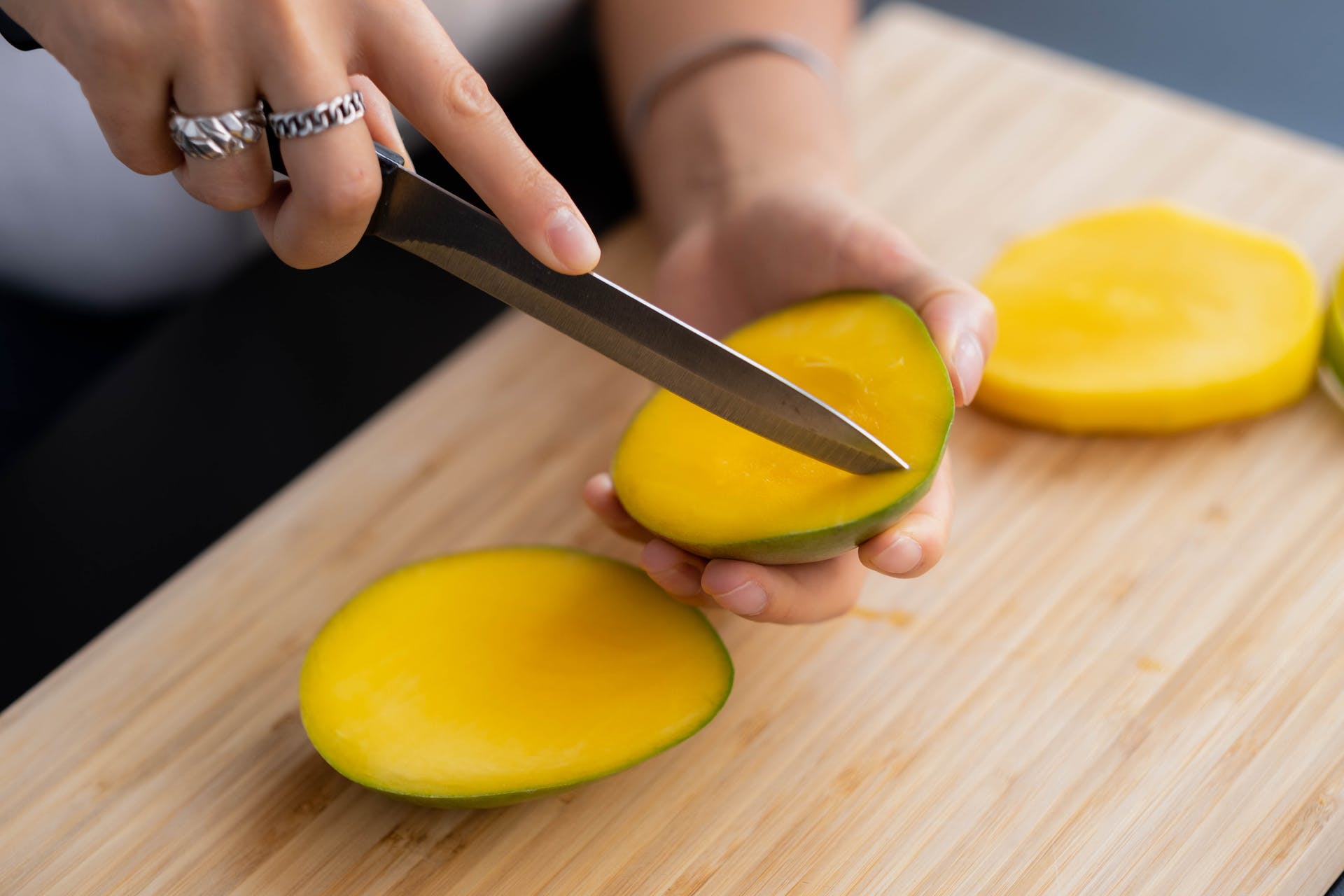 A mango being cut